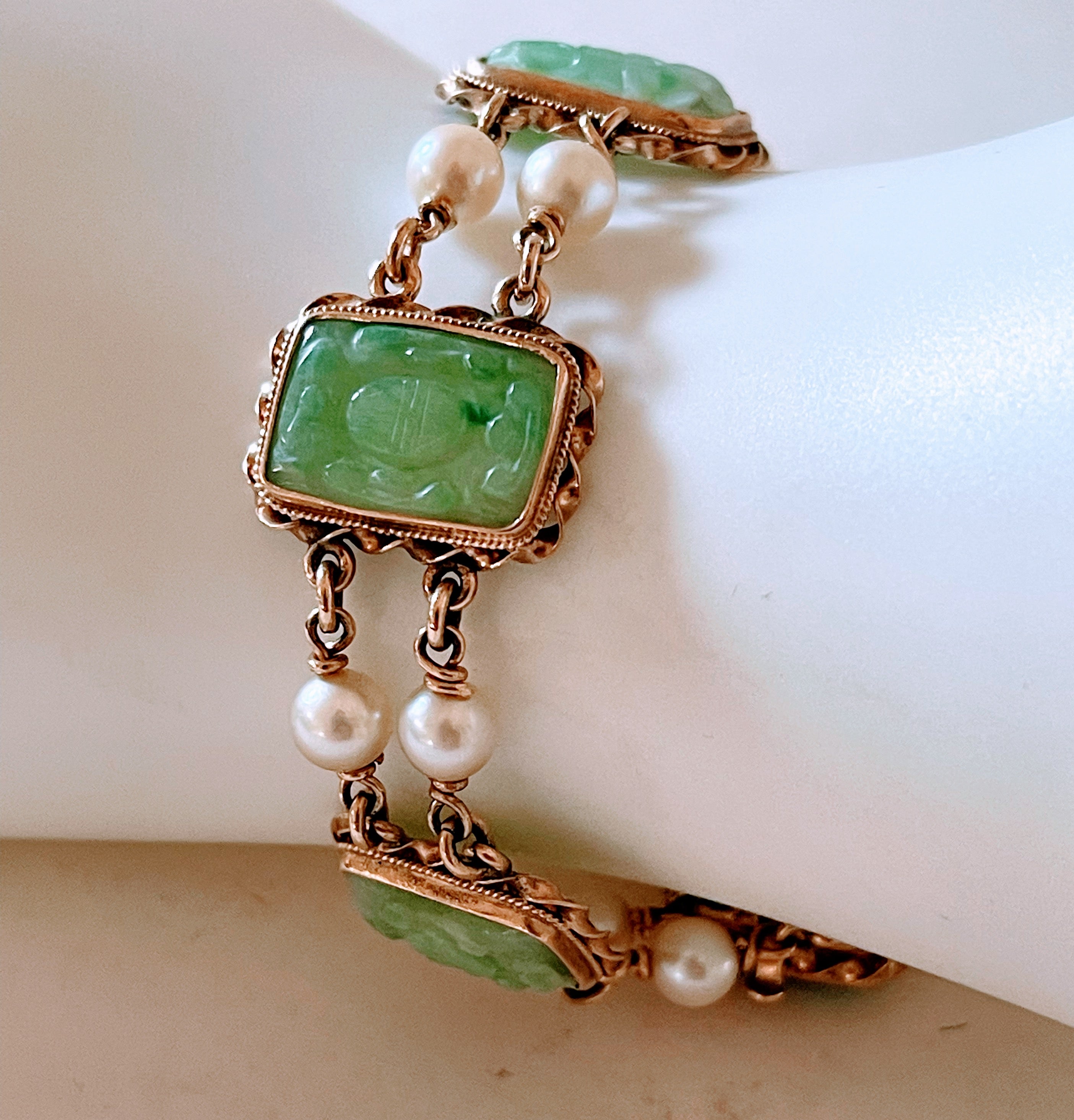 A vintage jade bangle bracelet. The jadeite bangle of circular D form made  of mottled green and whit