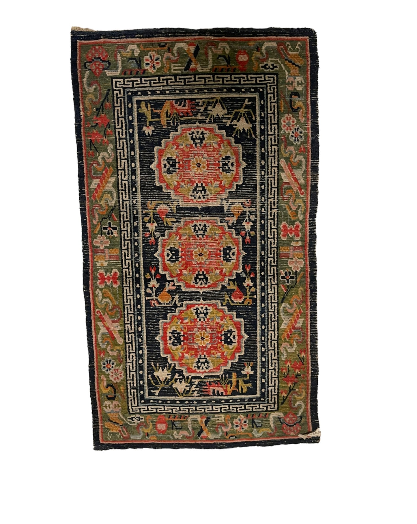 An antique Tibetan residential  rug with medallions