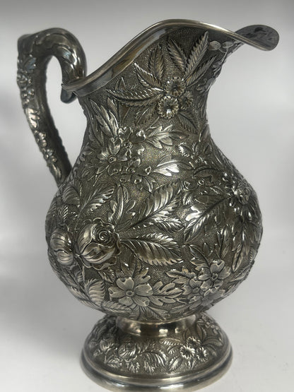 Early 20th C., antique hand chased pitcher