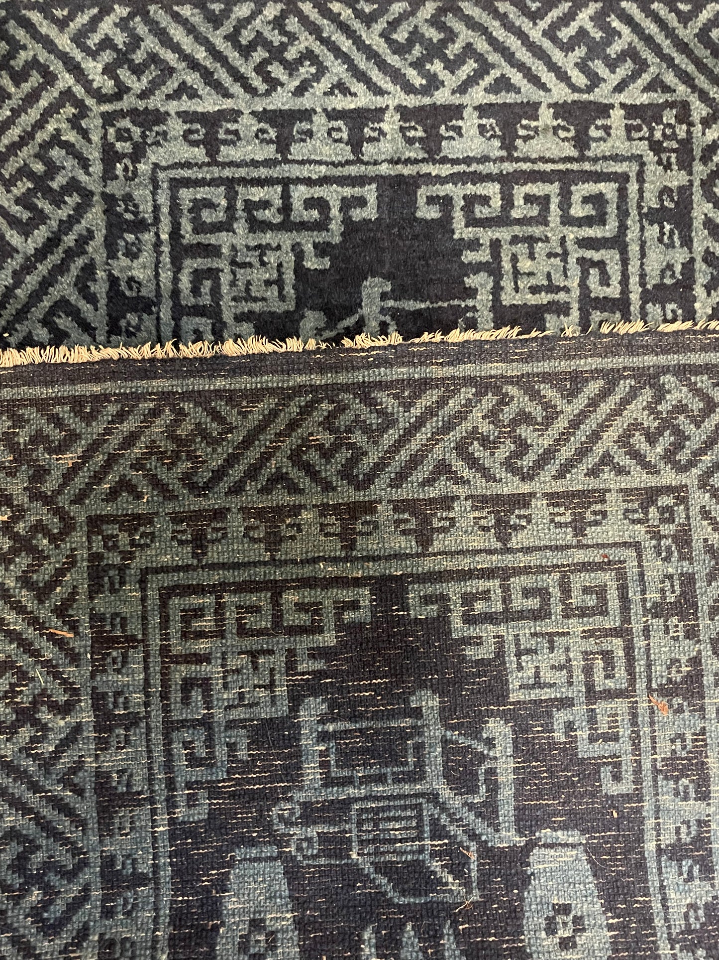 A vintage Baotao indigo rug
