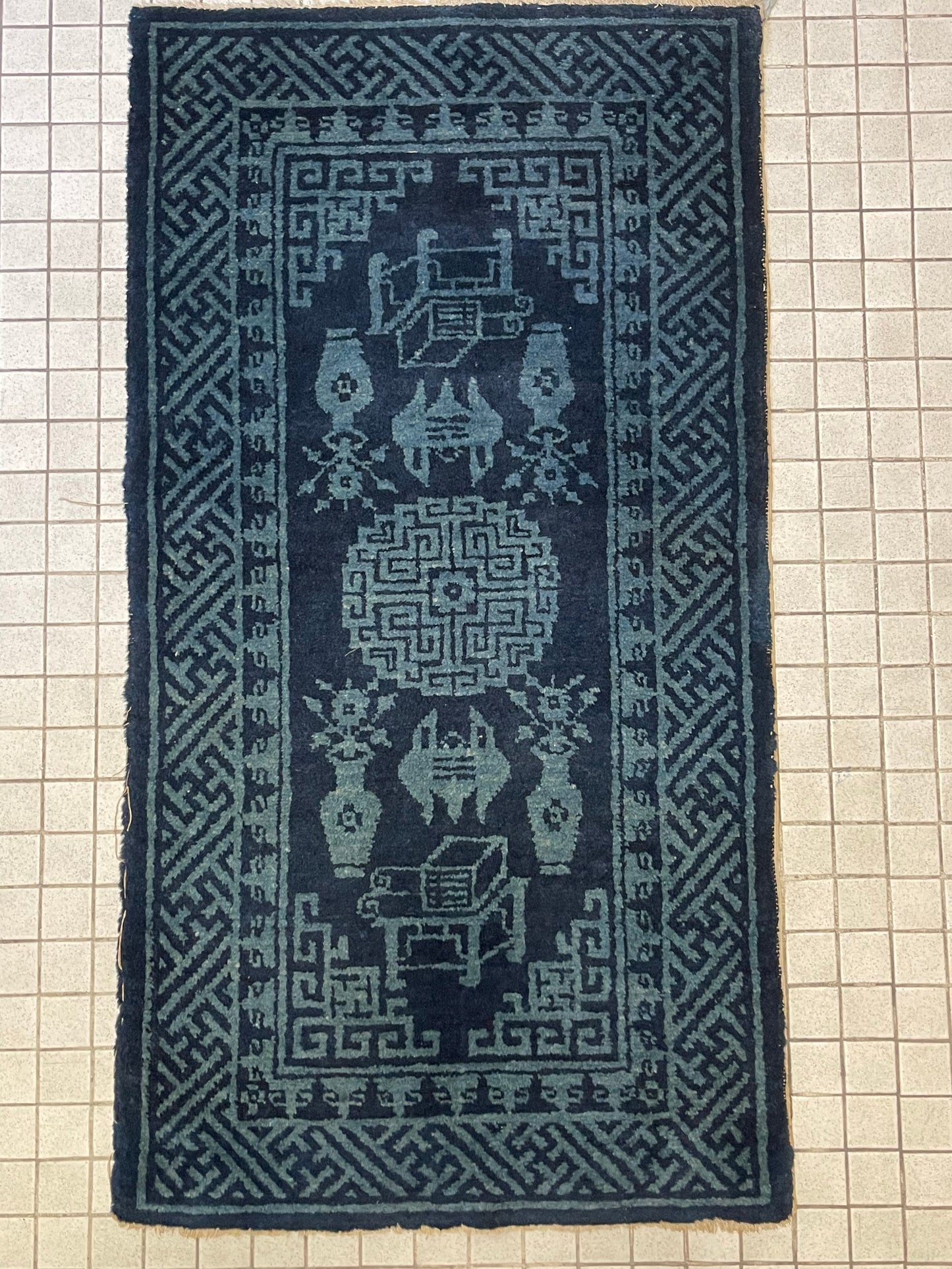 A vintage Baotao indigo rug