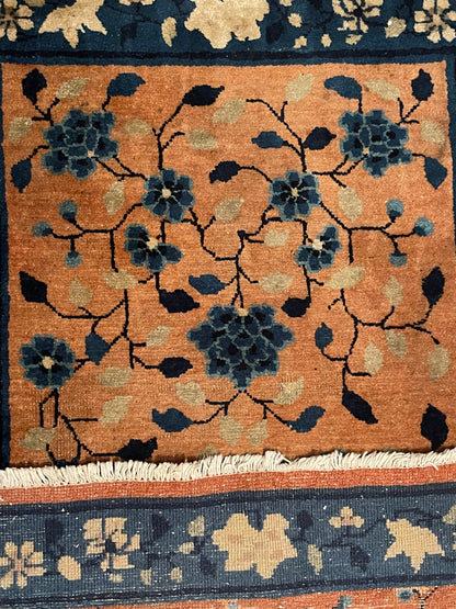An antique handwoven Chinese rug