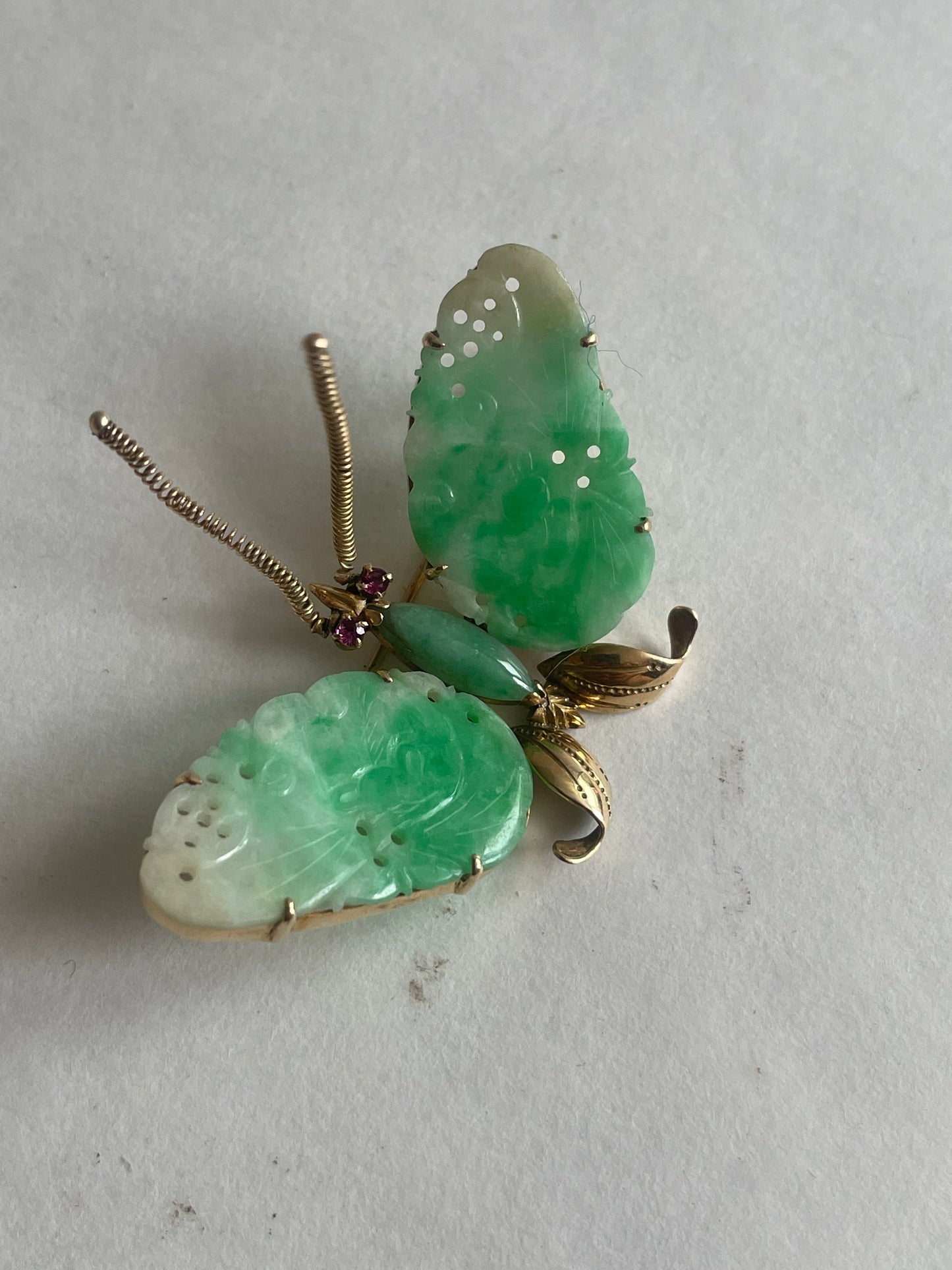 A vintage butterfly shaped brooch with jade and 14kt gold