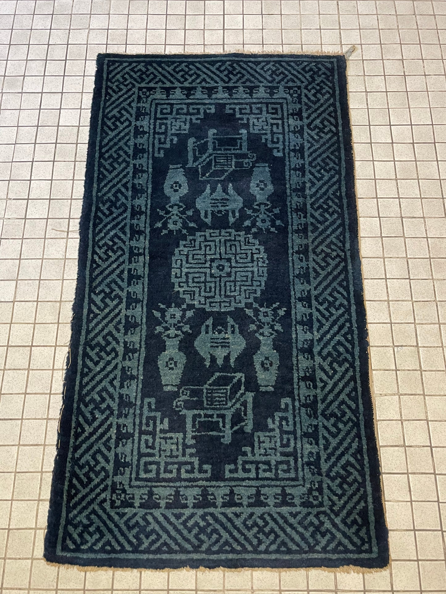 A vintage Baotao indigo rug