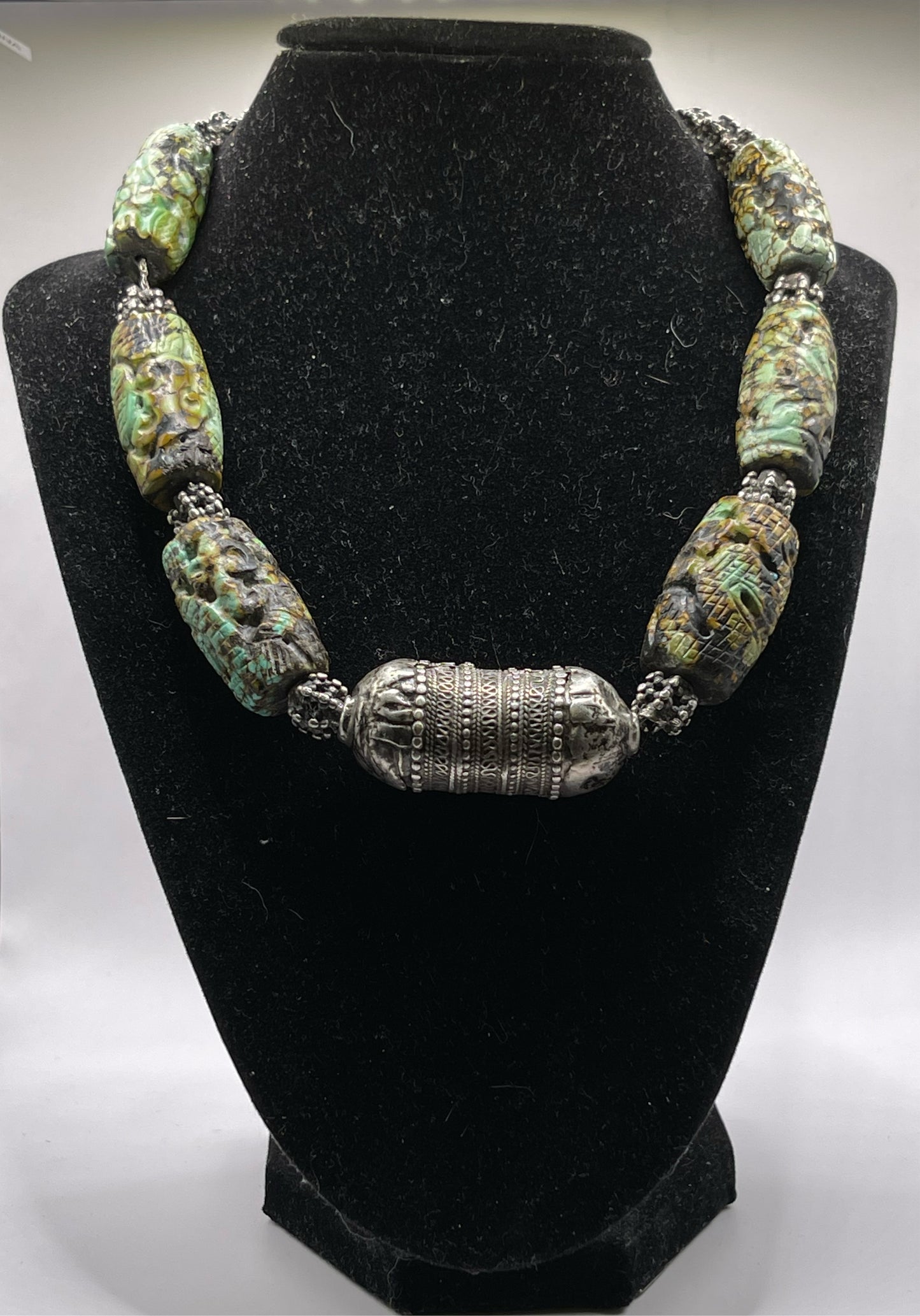 Vintage necklace with carved turquoise beads and antique silver beads