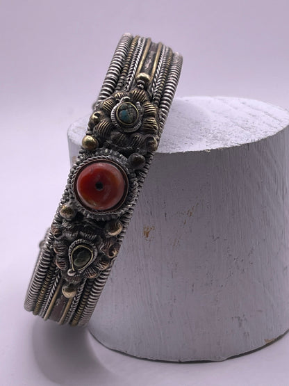 Antique Tibetan silver and coral bangle