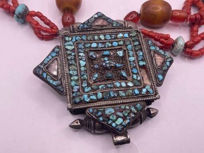 Antique ghau with coral and silver bead necklace