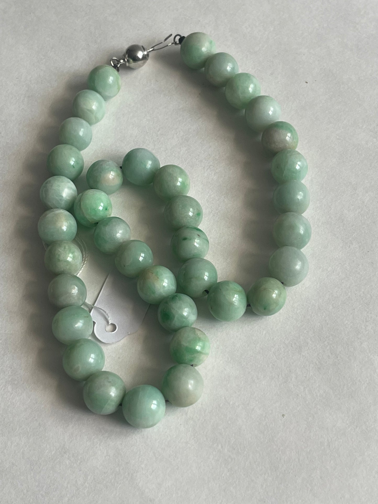 A necklace with vintage jade beads