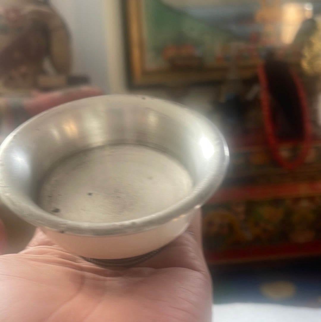 An antique Tibetan animal bone and silver tea cup