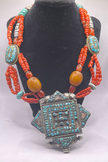 Antique ghau with coral and silver bead necklace