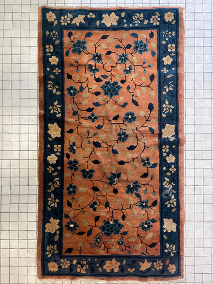 An antique handwoven Chinese rug