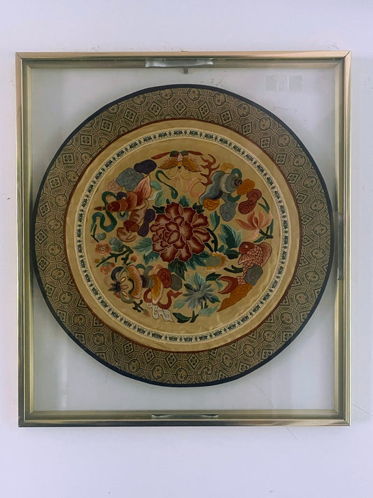 A framed embroidered 19th Century rank badge