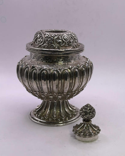 A vintage silver pot - bumpa