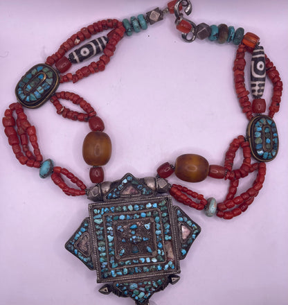 Antique ghau with coral and silver bead necklace