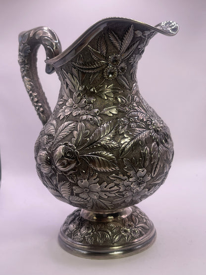Early 20th C., antique hand chased pitcher