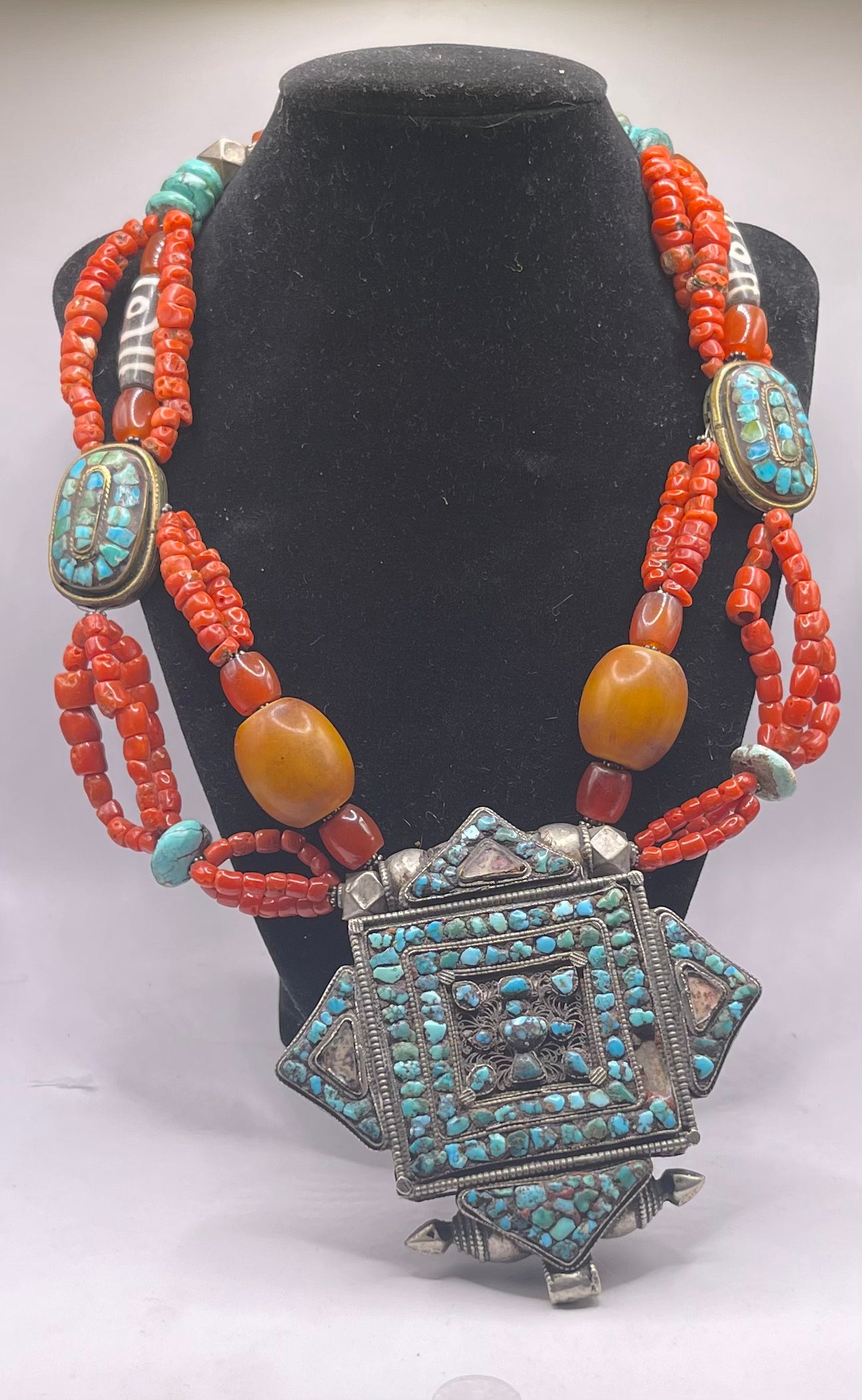 Antique ghau with coral and silver bead necklace