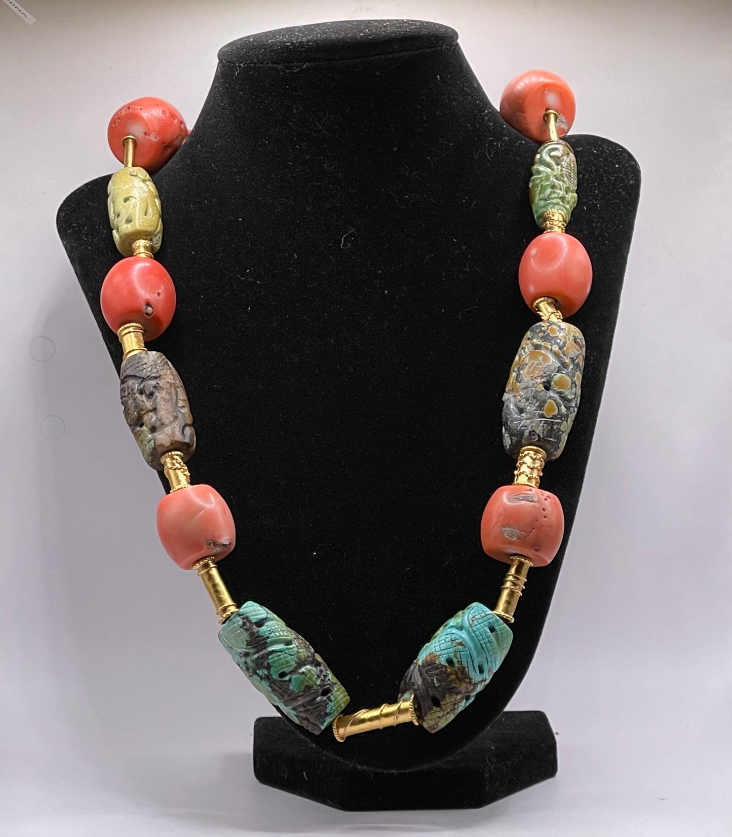 A necklace with vintage carved beads