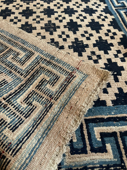 Antique Tibetan wool geometrical vegetable dyed rug