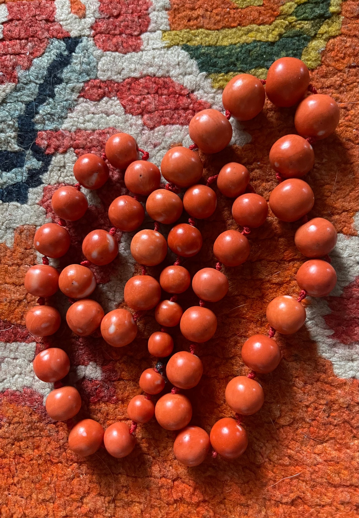 A necklace with vintage momo coral beads