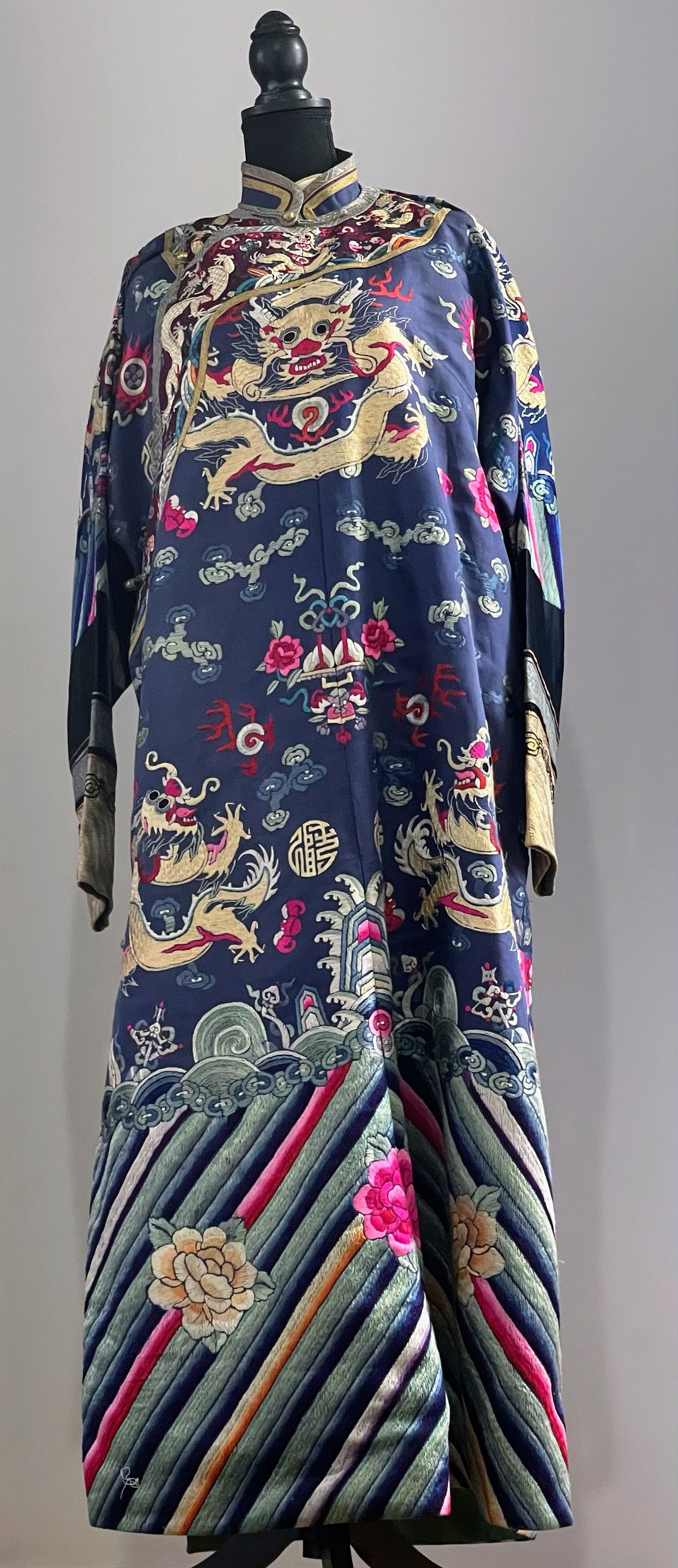 An antique blue silk embroidered dragon robe