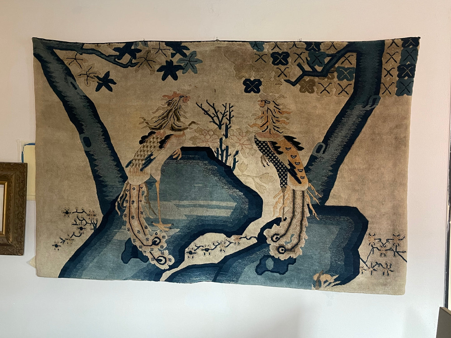 An antique Chinese pictorial rug