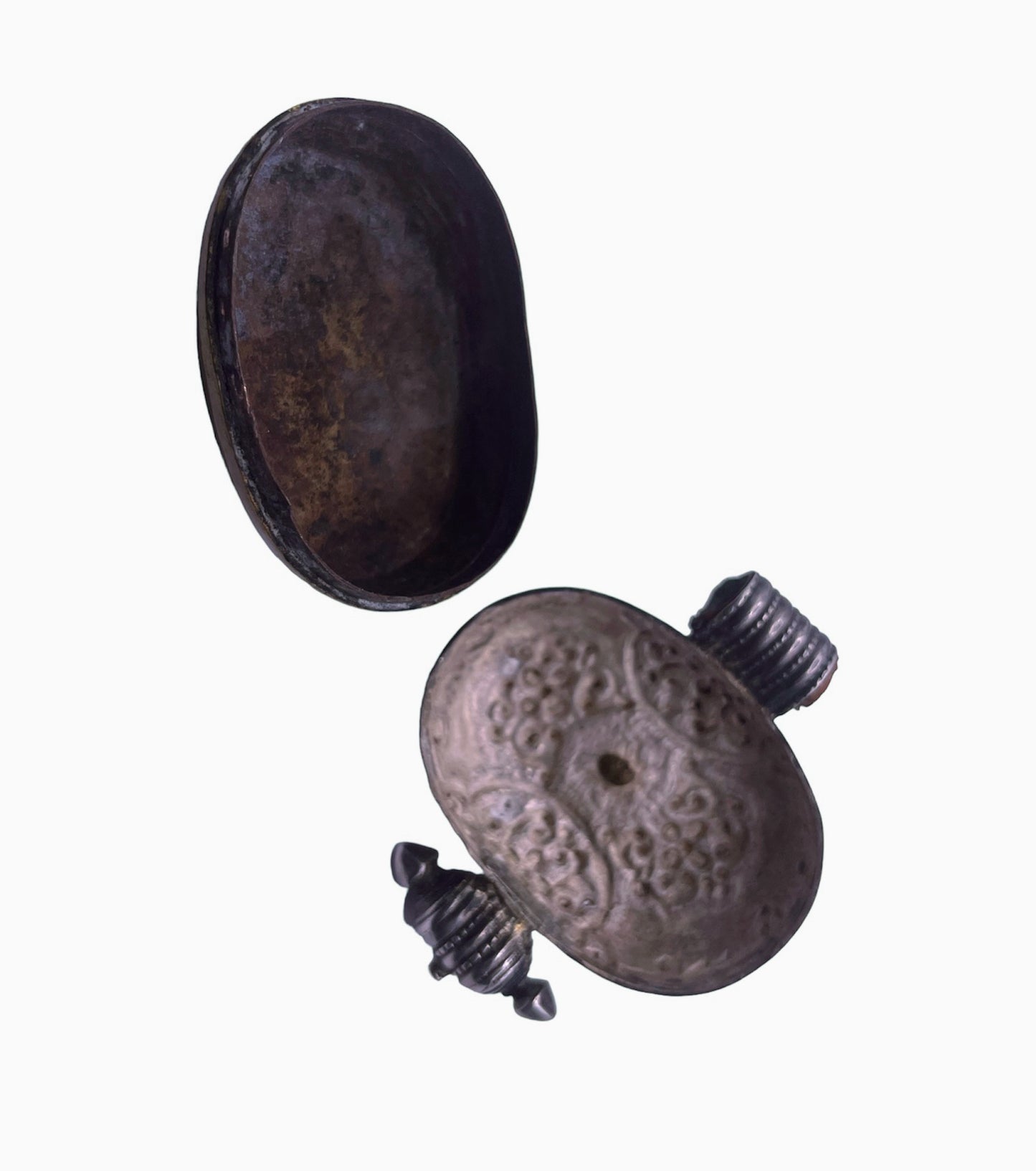 An antique silver and coral ghau amulet