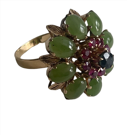 A vintage jade, ruby and sapphire cocktail ring