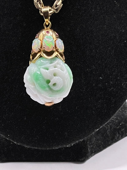 Carved shou jade bead pendant with opals and ruby
