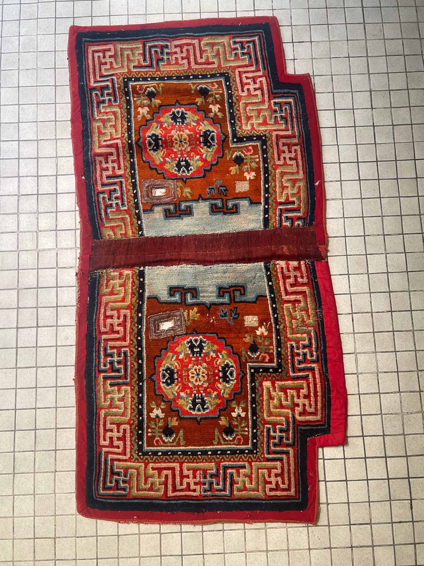 An antique Tibetan saddle rug