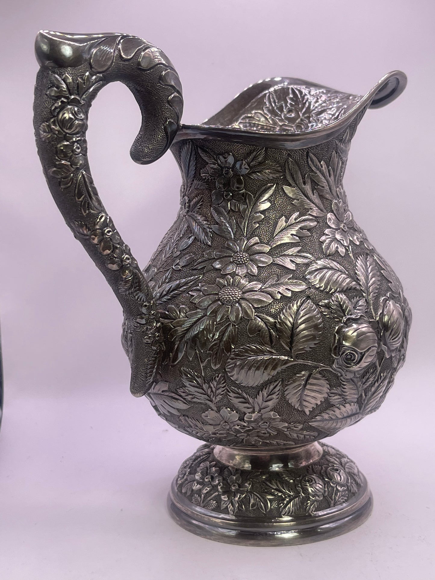 Early 20th C., antique hand chased pitcher