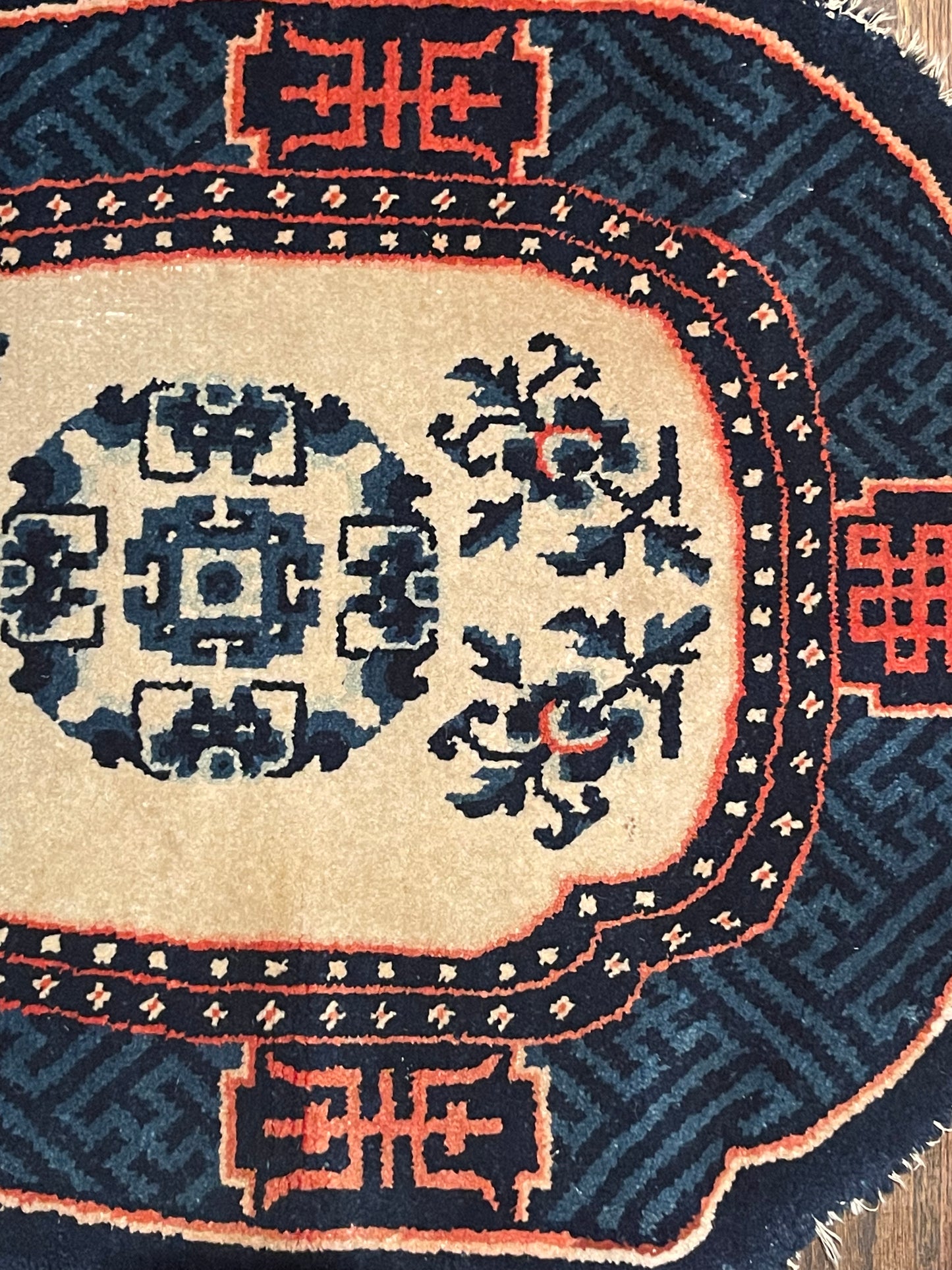 A vintage  Tibetan  indigo rounded woolen saddle rug