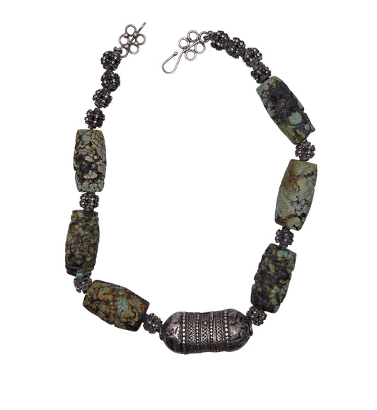 Vintage necklace with carved turquoise beads and antique silver beads