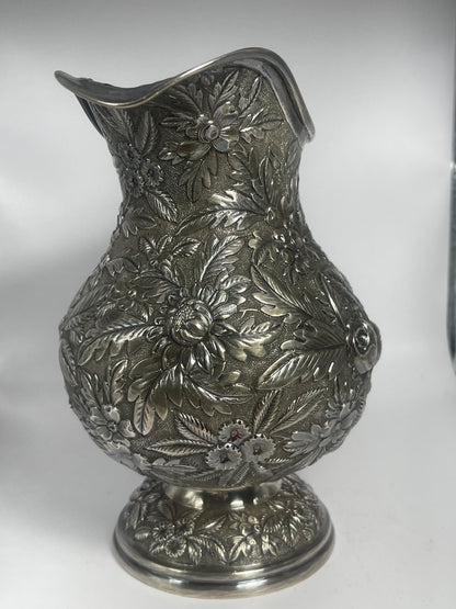 Early 20th C., antique hand chased pitcher
