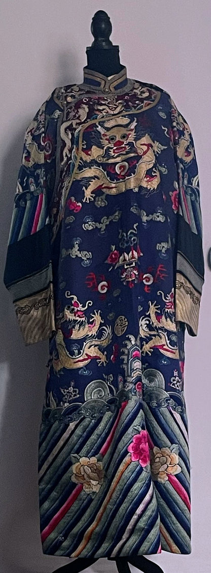 An antique blue silk embroidered dragon robe