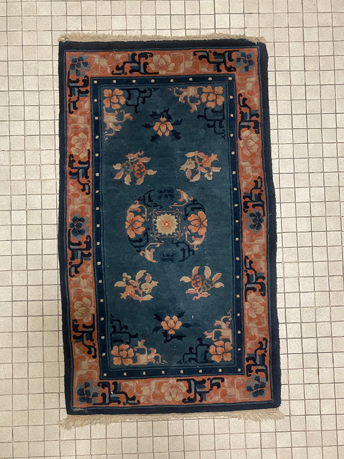 A vintage Chinese art-deco rug