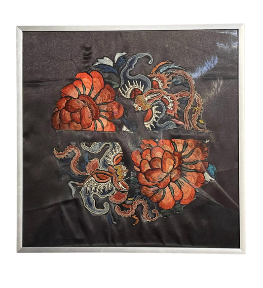 An antique framed Chinese embroidered textile fragment