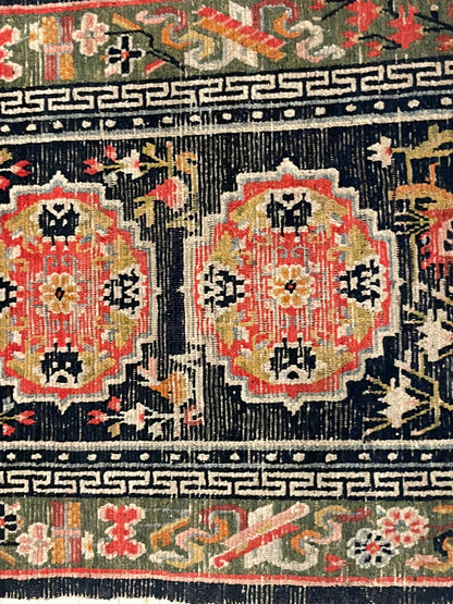 An antique Tibetan residential  rug with medallions