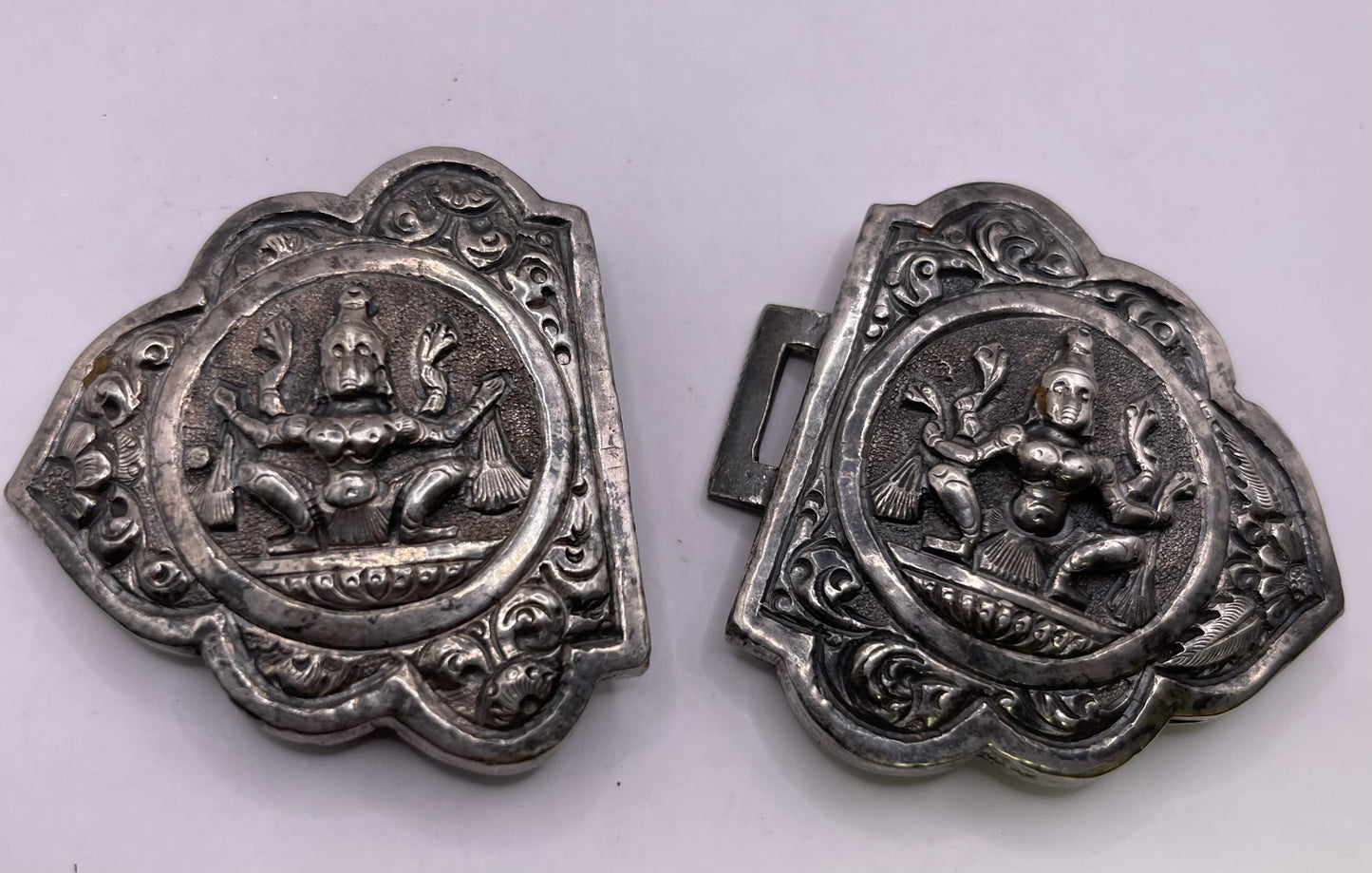 Silver indian carved belt buckles