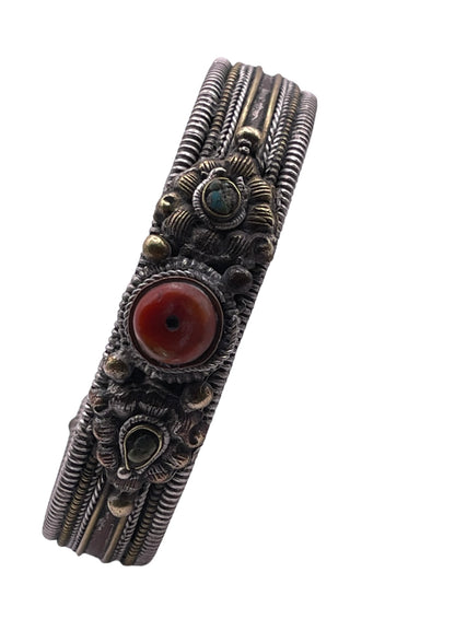 Antique Tibetan silver and coral bangle