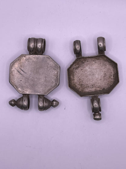 An antique 19th C., few Tibetan silver ghau with silver filigree and turquoise.