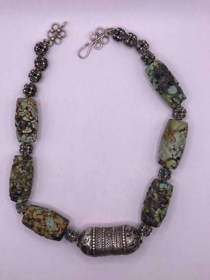 Vintage necklace with carved turquoise beads and antique silver beads