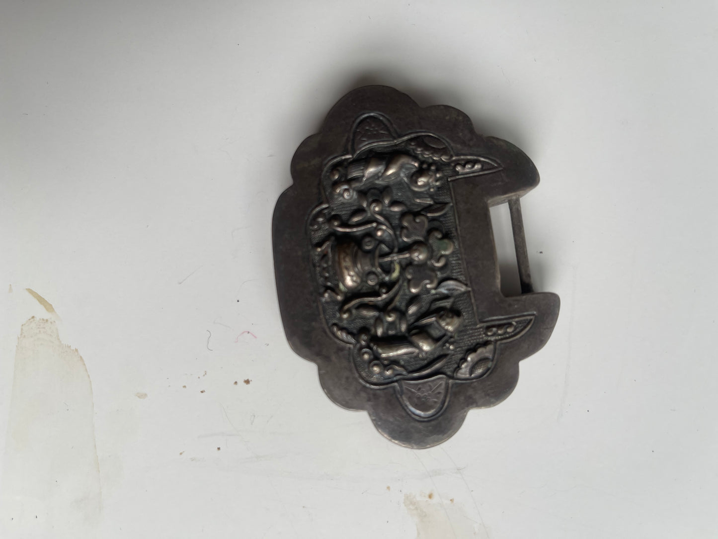 An antique Mongolian silver spirit lock