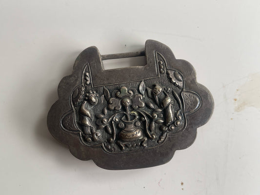 An antique Mongolian silver spirit lock