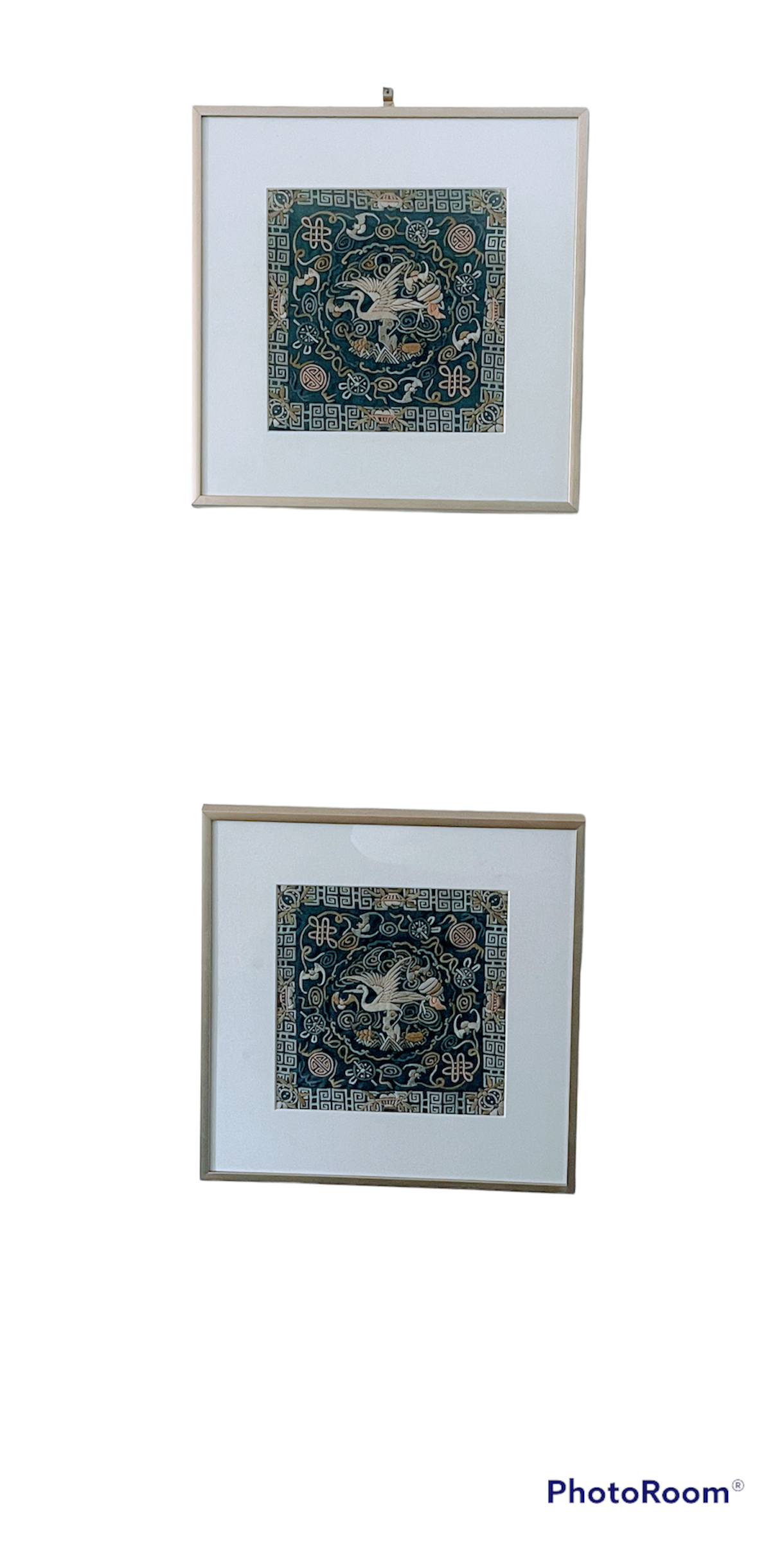 An antique framed Chinese embroidered textile fragment