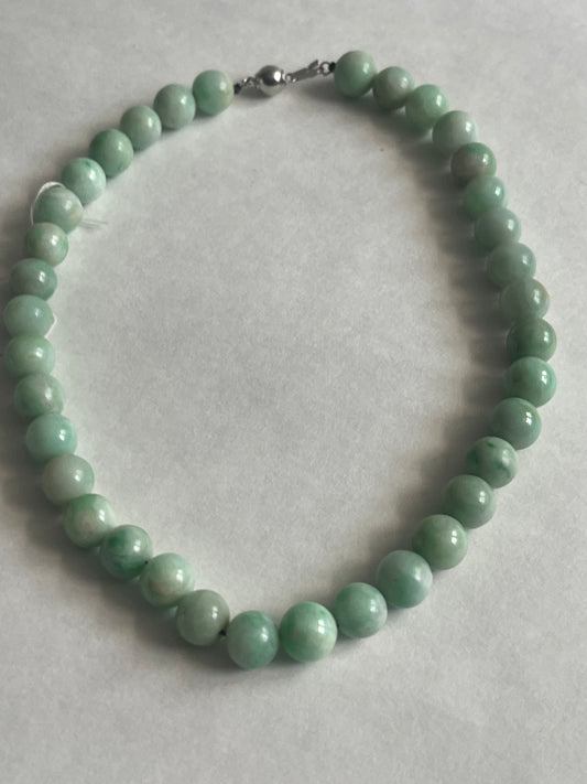 A necklace with vintage jade beads