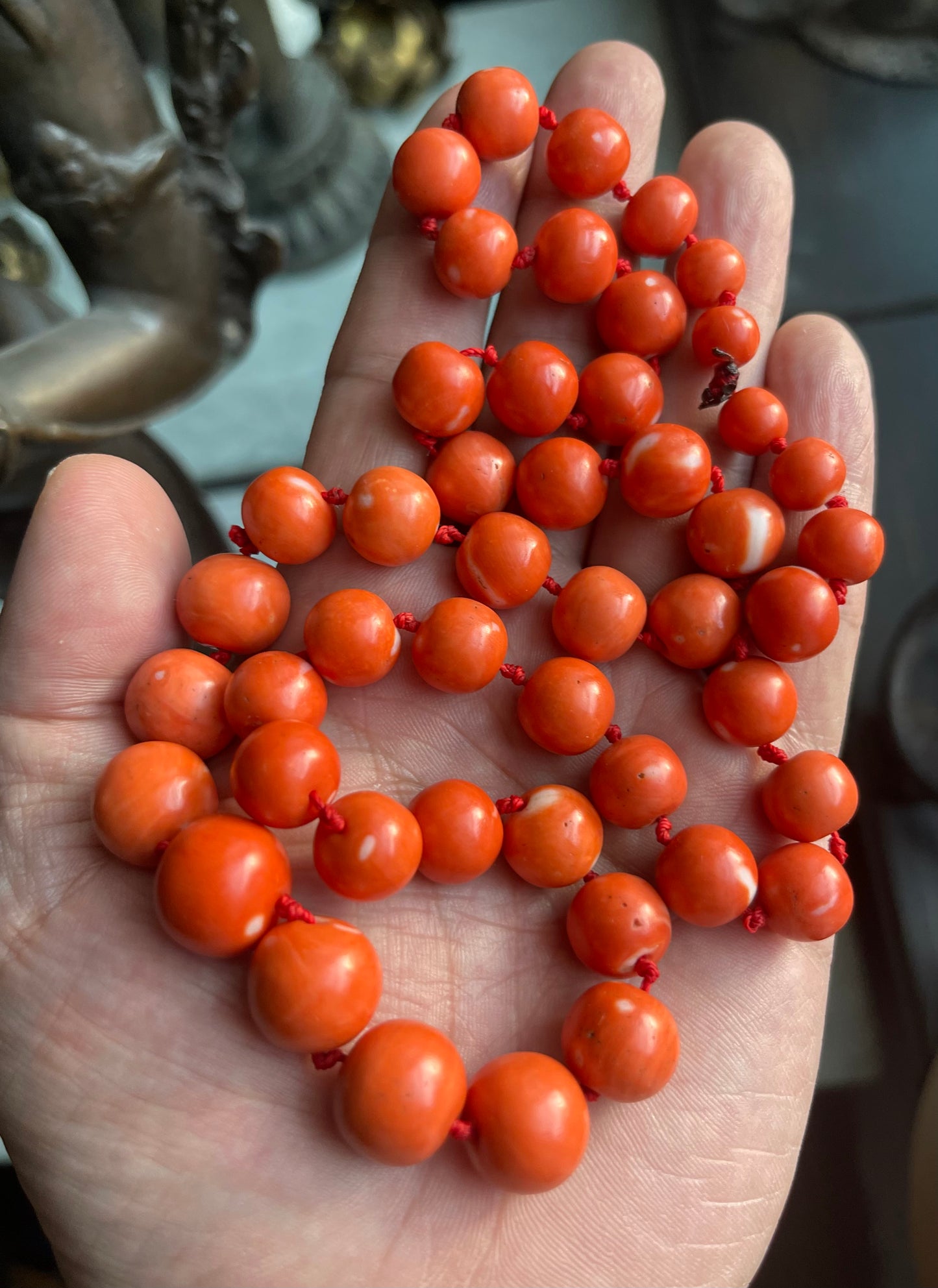 A necklace with vintage momo coral beads