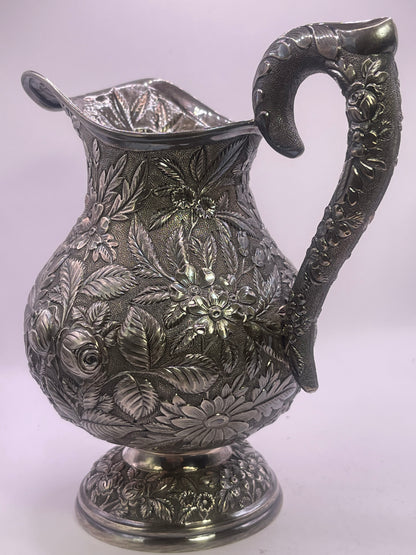 Early 20th C., antique hand chased pitcher