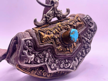 An antique Tibetan mechak purse with turquoise
