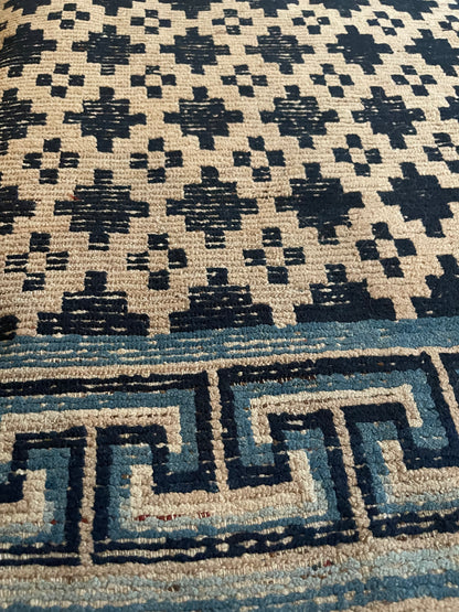 Antique Tibetan wool geometrical vegetable dyed rug