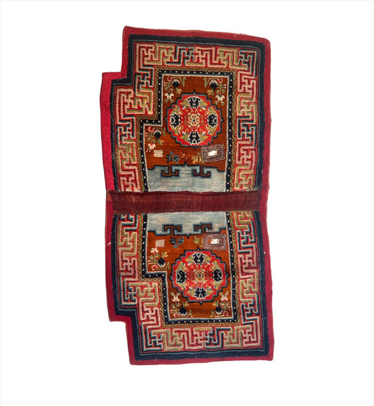 An antique Tibetan saddle rug